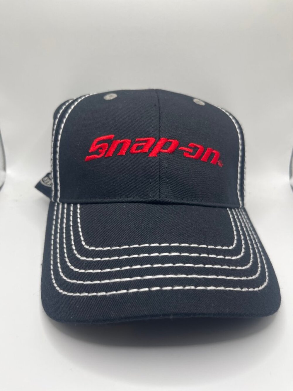Snap-on Black Baseball Cap — Red Script Logo, First Vintage Steel